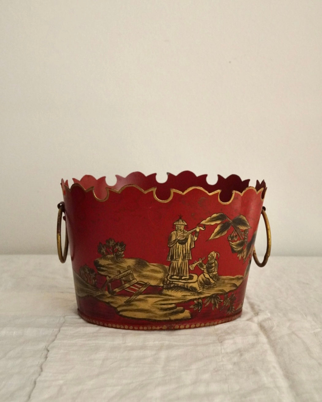 Chinese artwork on red background metal basket with handles