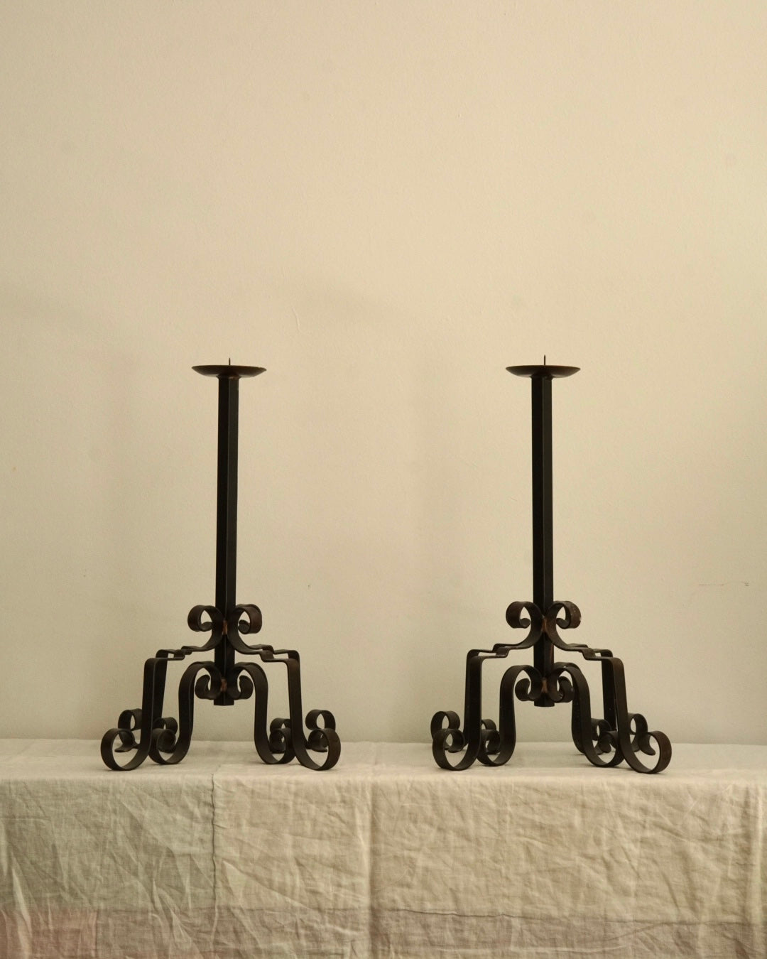 Pair of steel candle holders