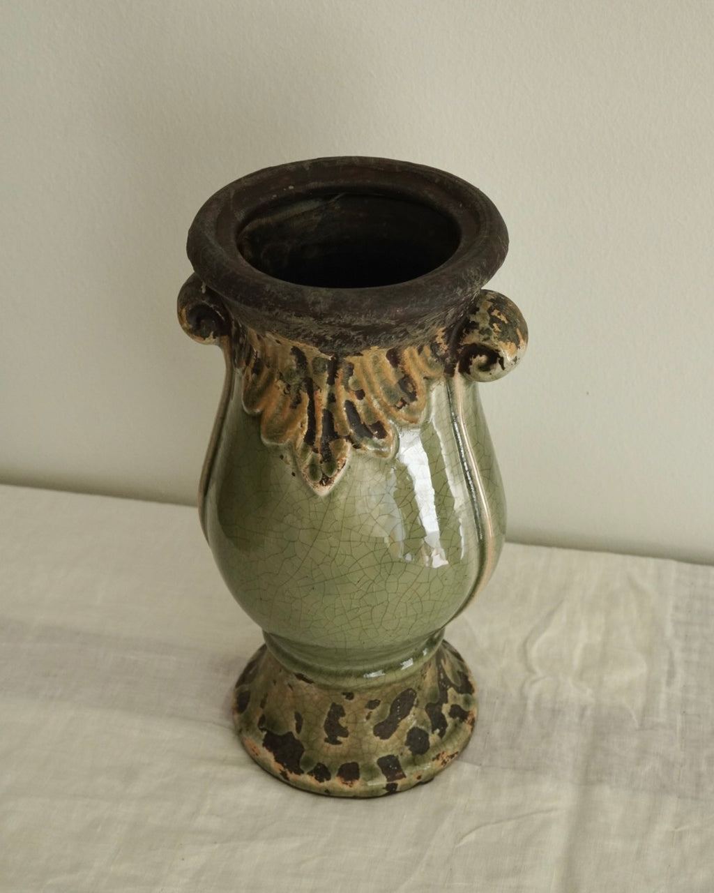 Light green and grey ceramic vase with scroll handles