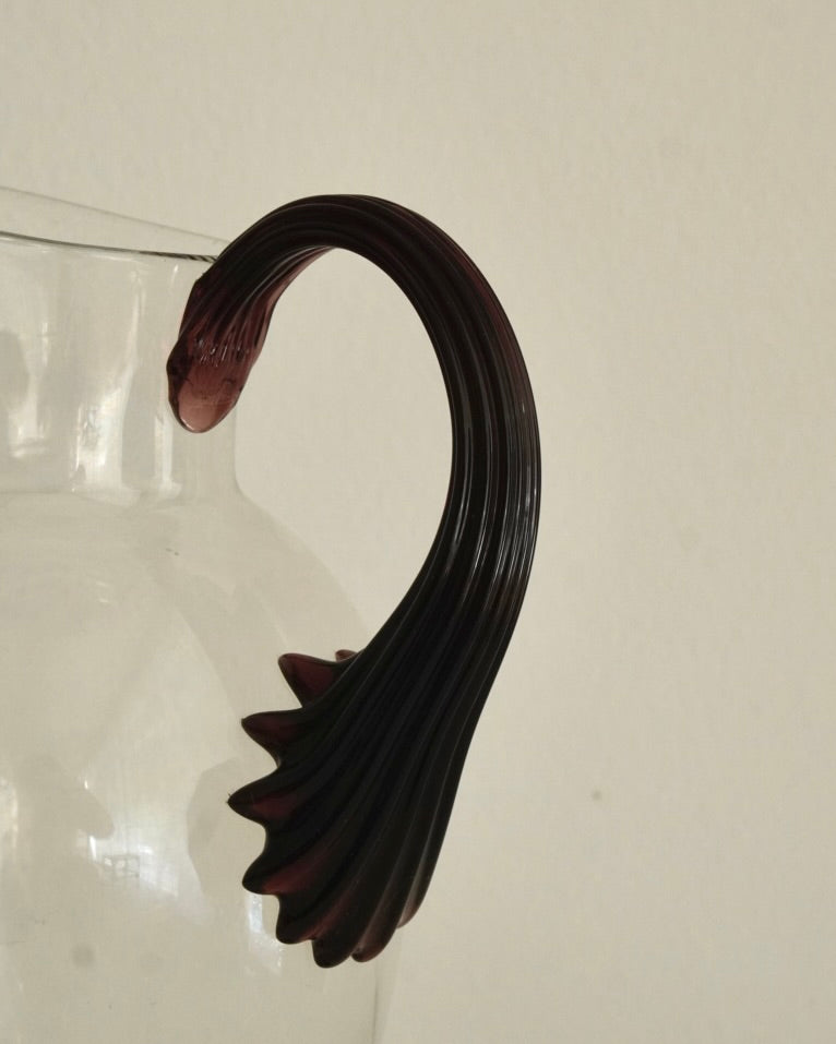Glass pitcher vase with star like dark purple handle