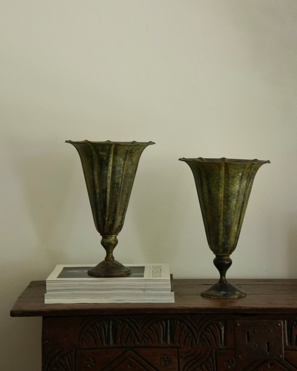 Pair of verdigris scalloped brass vases