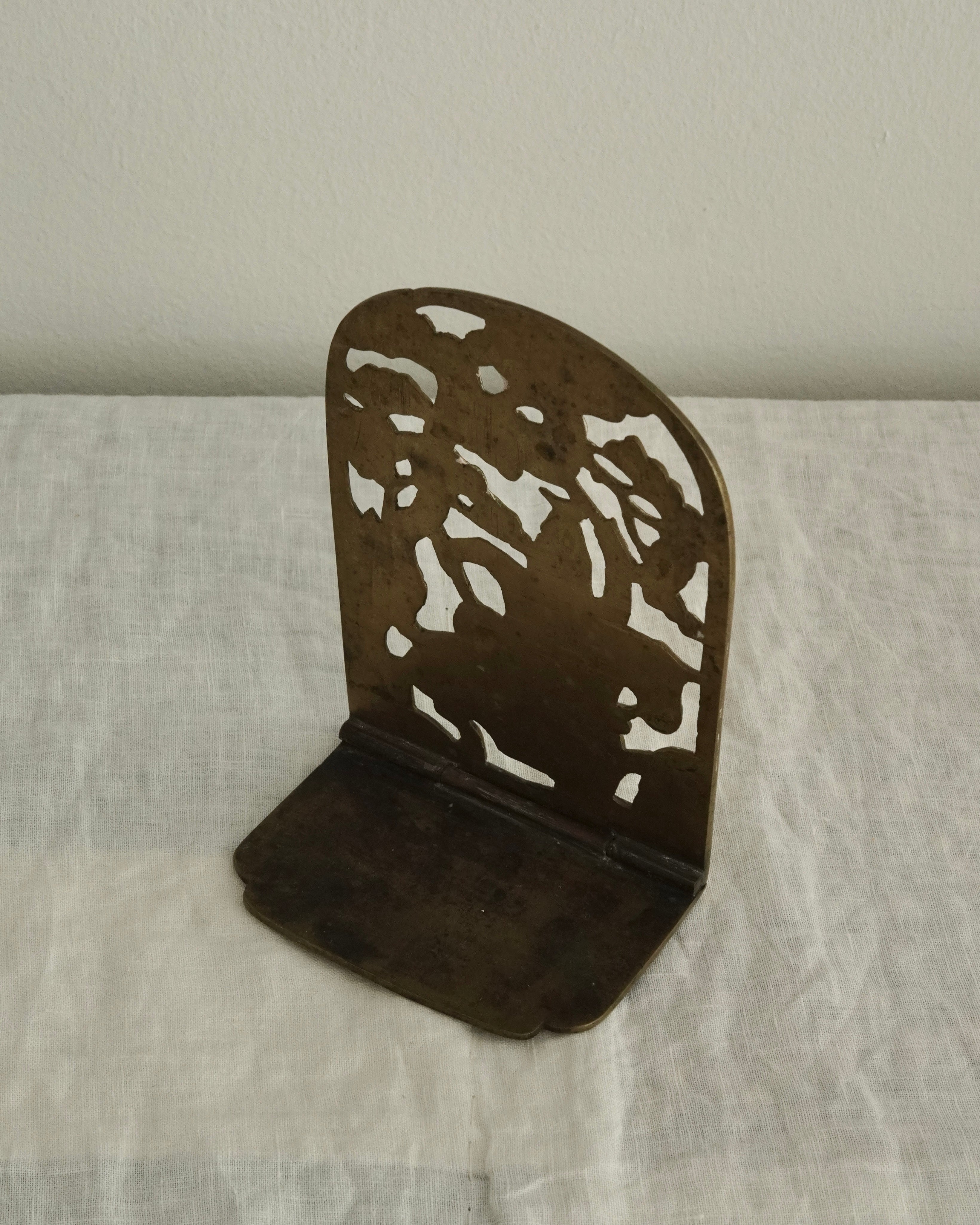 Brass chinese man on a horse bookend