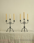 Pair of wrought iron candle holders