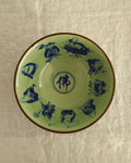 Chinese celadon & blue porcelain bowl with 9 monks
