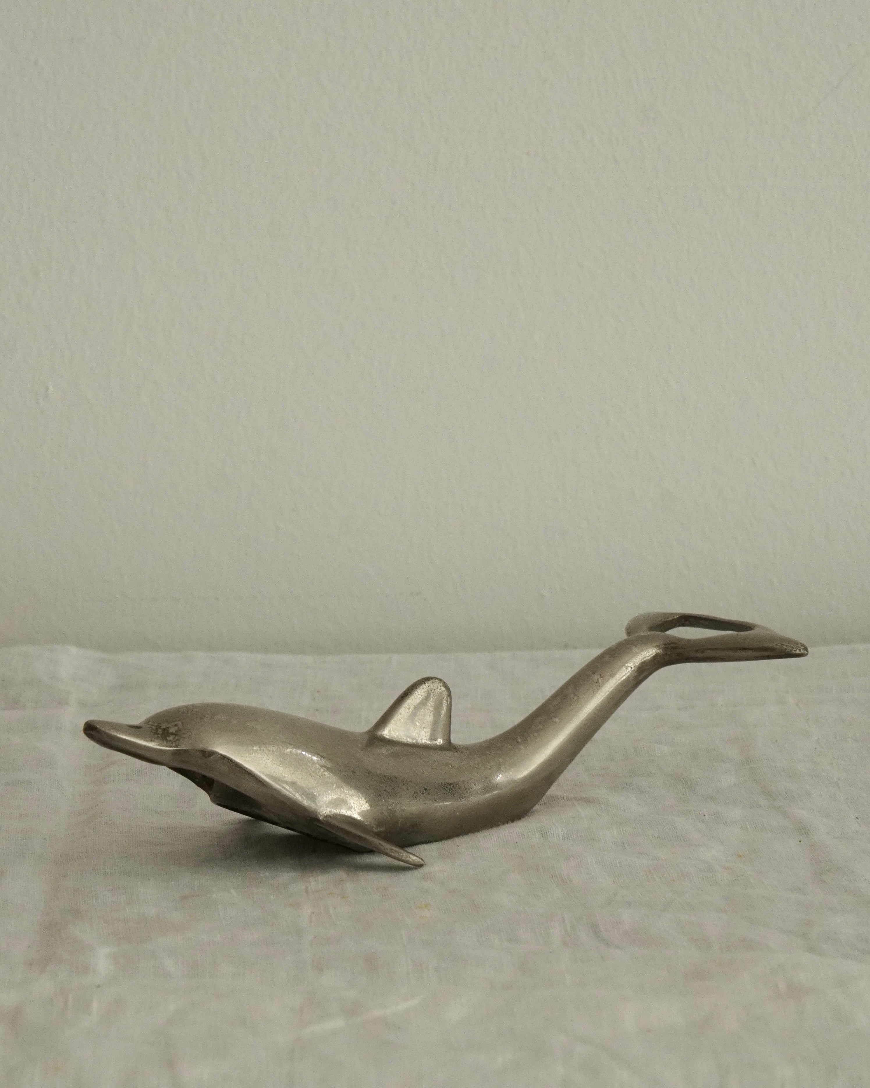 Silver plated dolphin bottle opener