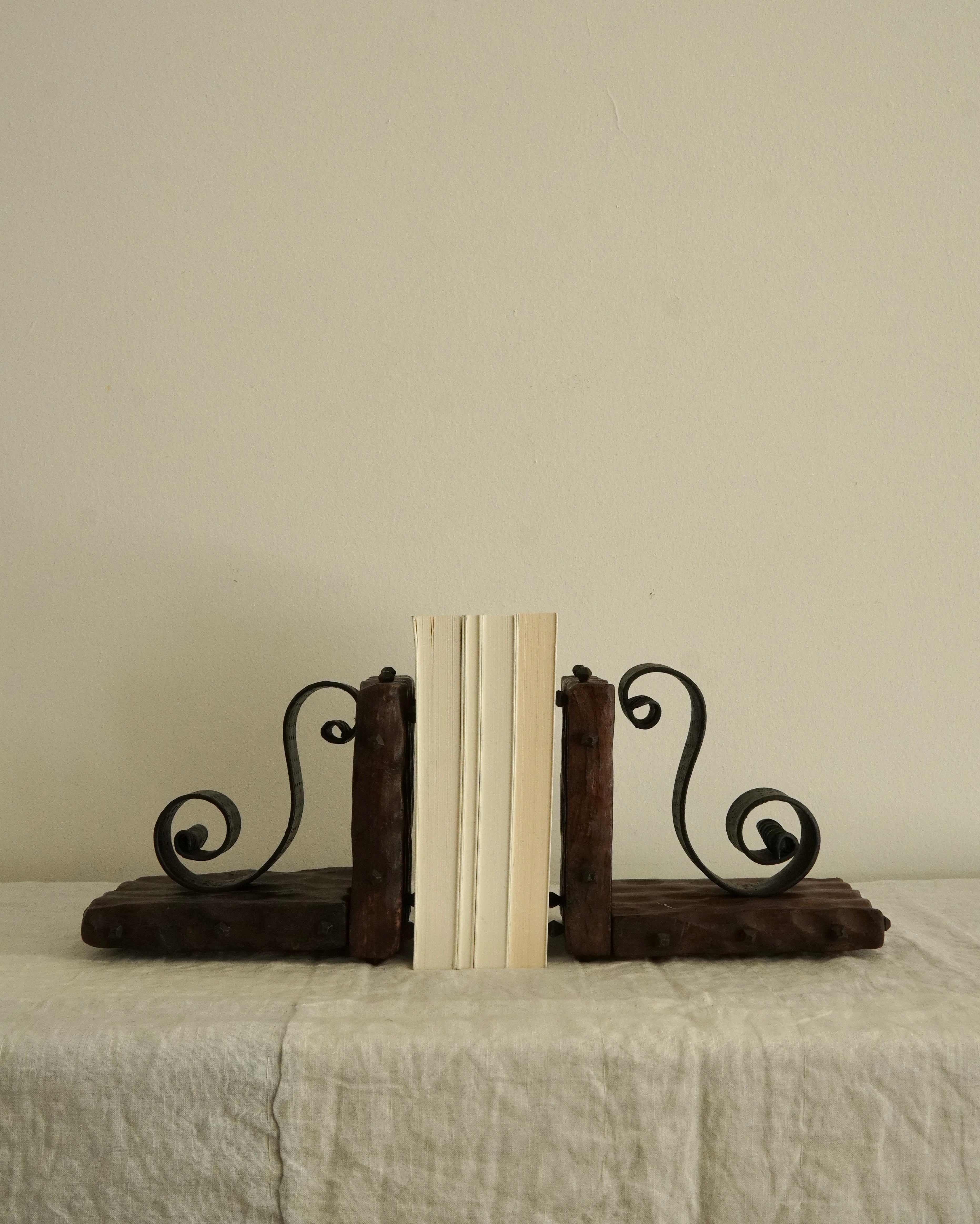 Pair of brutalist wood and metal spiral bookends