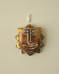 Carved wooden sun smiley face wall hanging