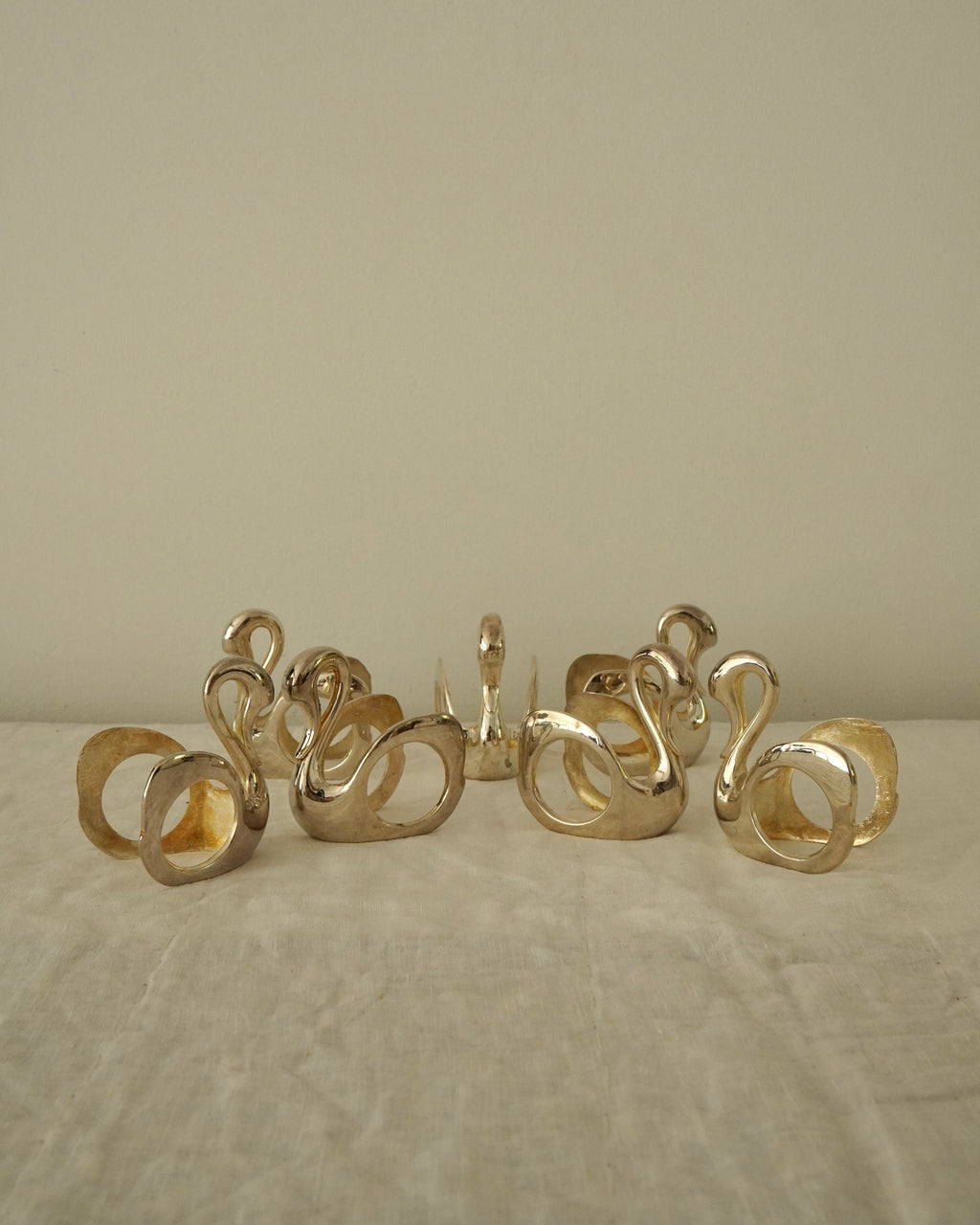 Set of 7 silver plated swan napkin holders