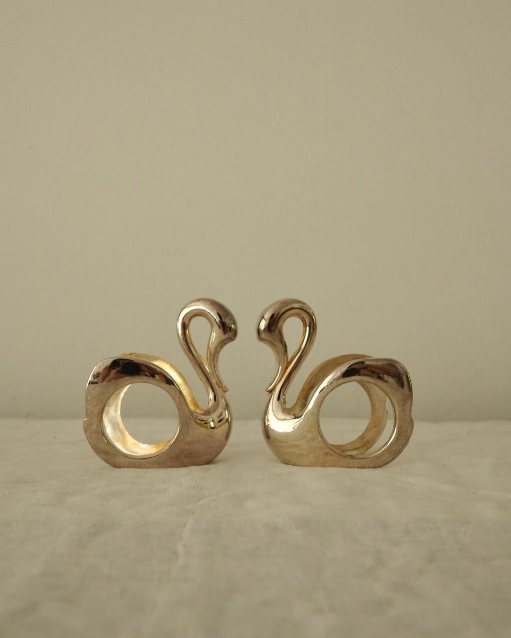 Set of 7 silver plated swan napkin holders
