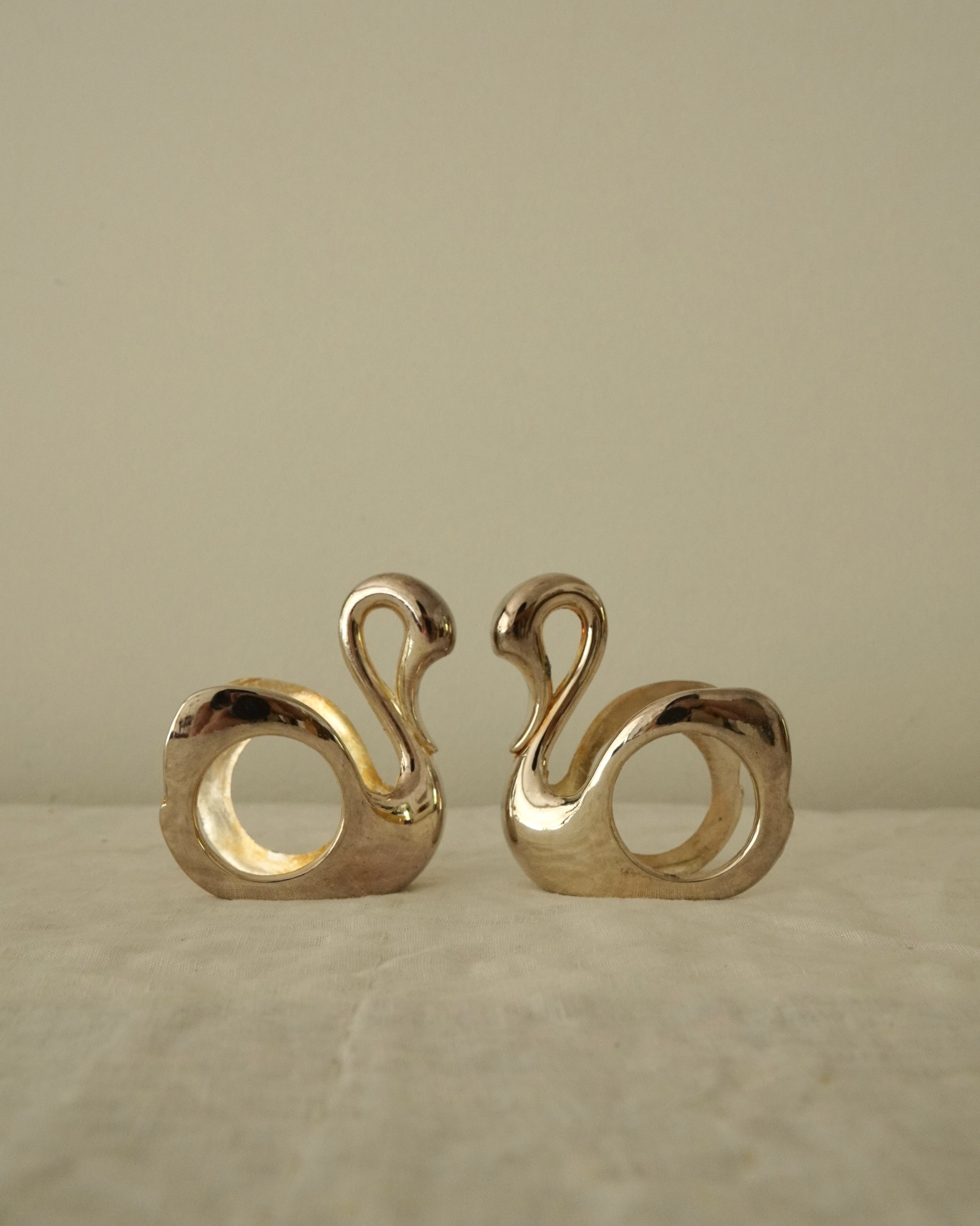 Set of 7 silver plated swan napkin holders