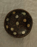 Coconut shell trinket bowl with spiral motif and mother of pearl inlay
