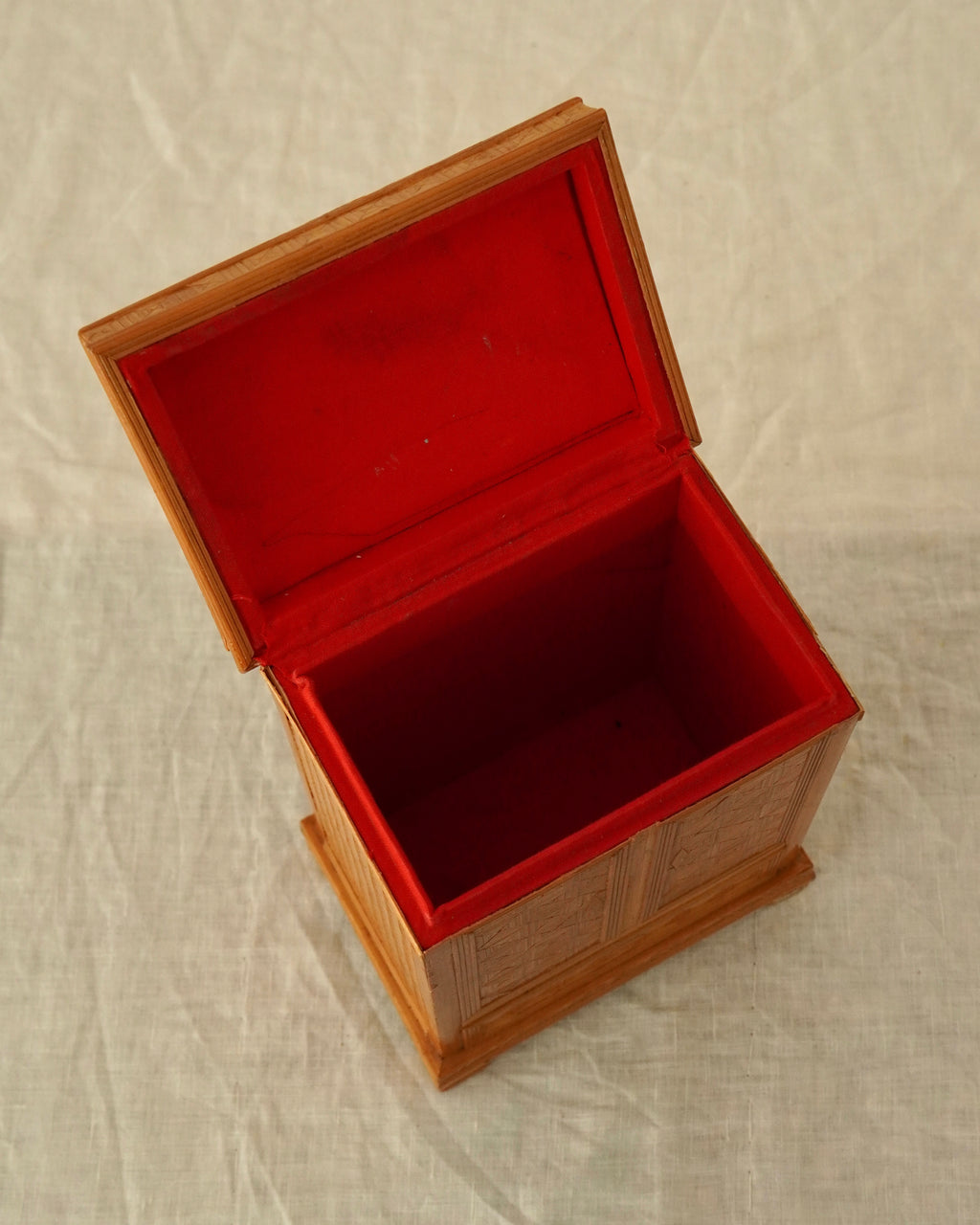 Tramp art storage box in the design of a wardrobe