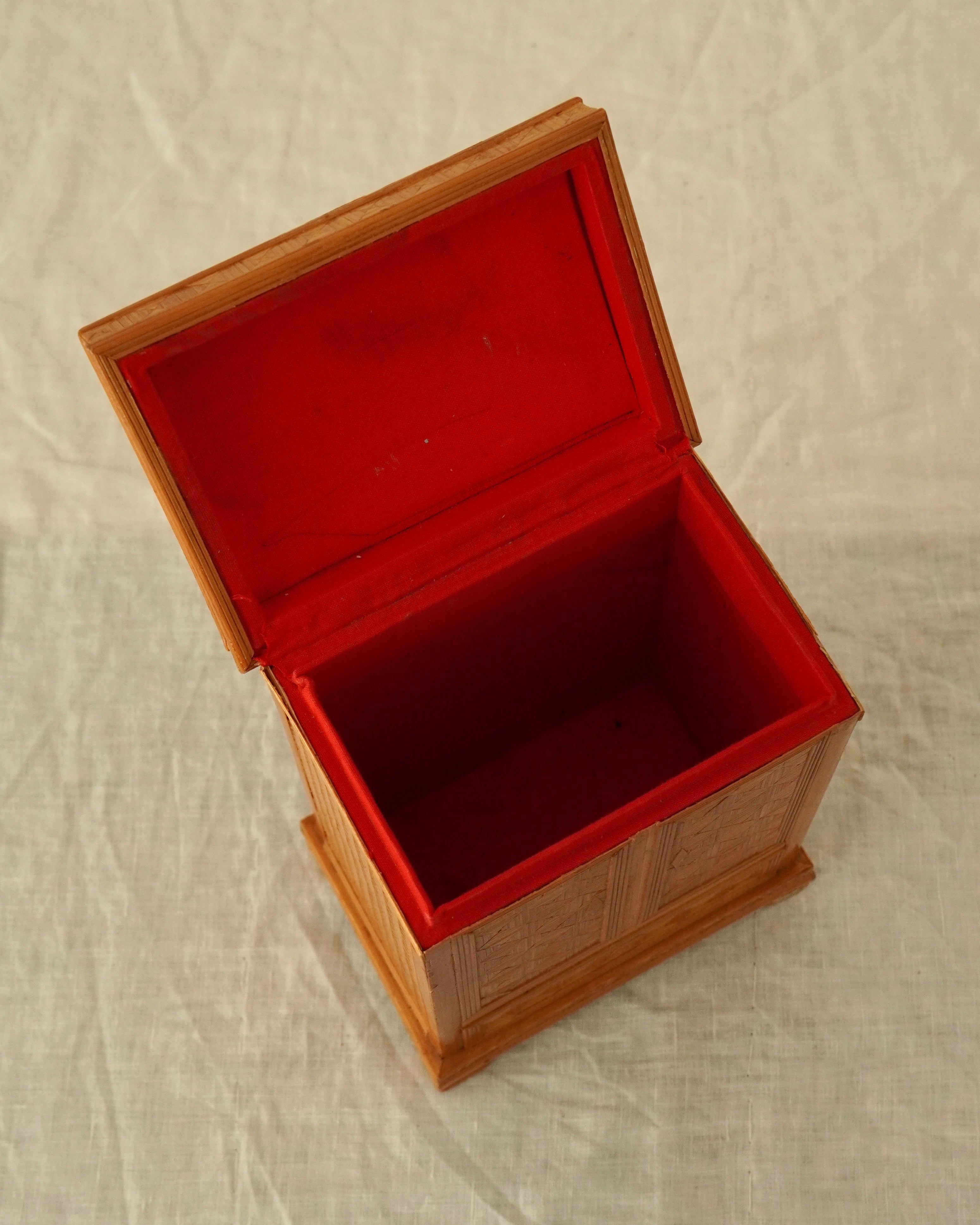Tramp art storage box in the design of a wardrobe