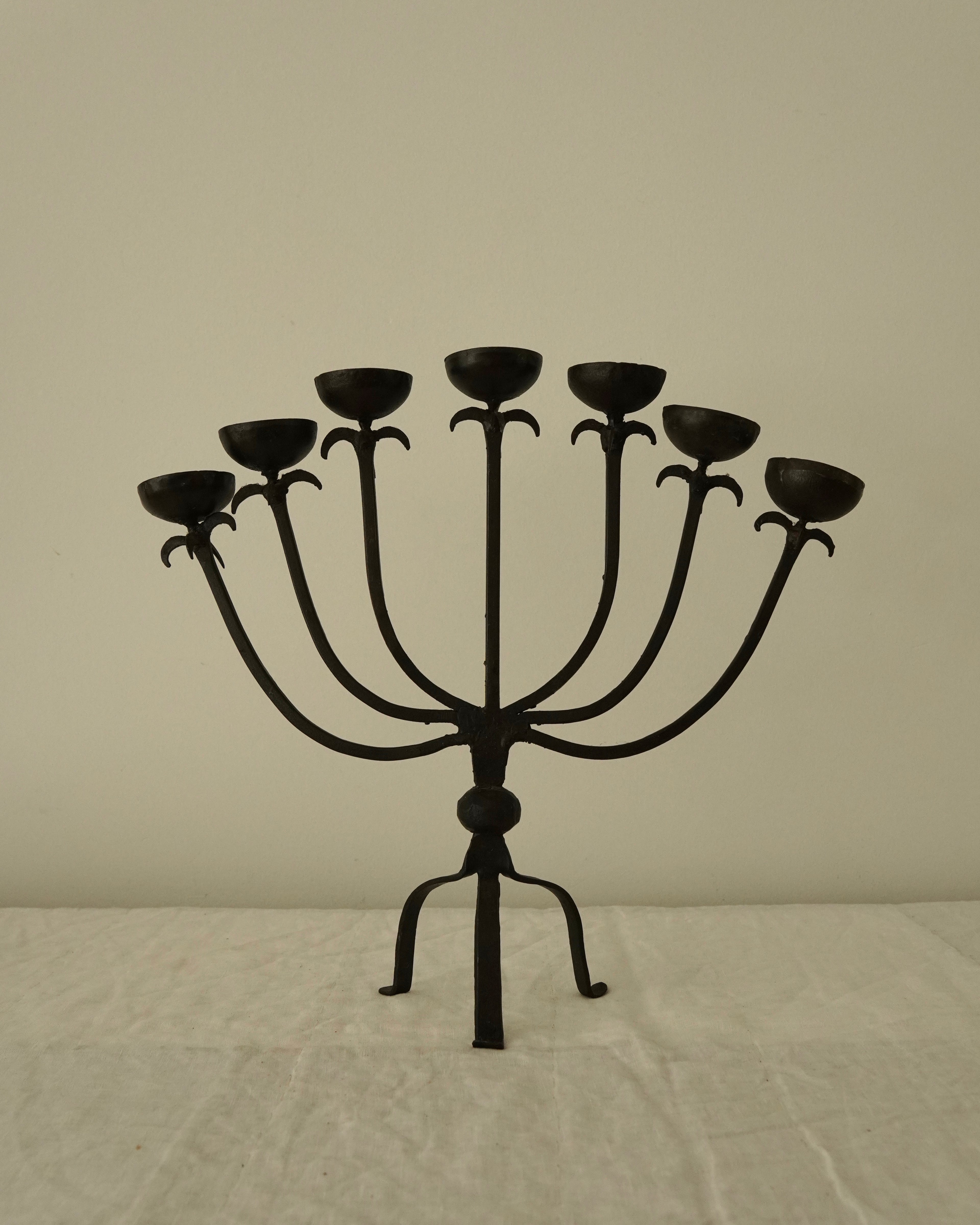 Cast iron candelabra, holds 7