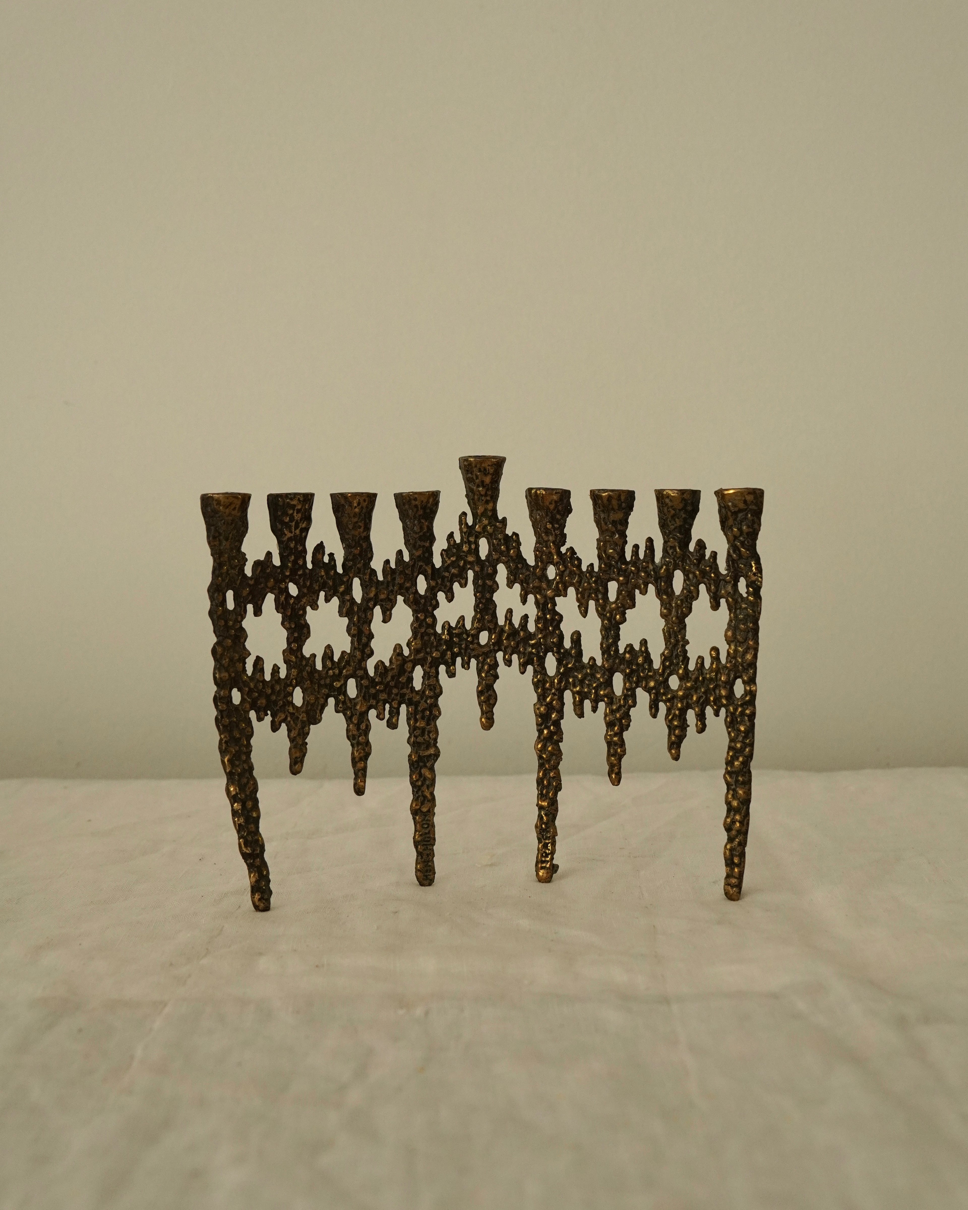 Brutalist candelabra, holds 9 (gold, black)