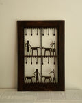 Ethnographic wall mounted panel featuring wrought iron animal and human figures