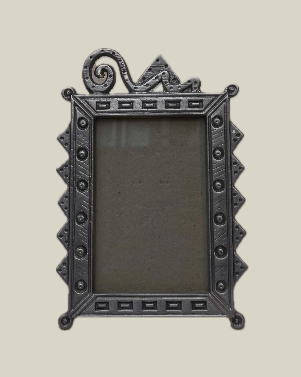 Memphis style metal photo frame with stand at the back