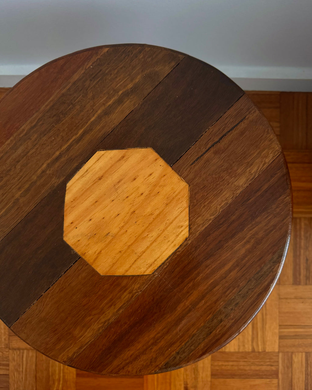 Round wood marquetry table