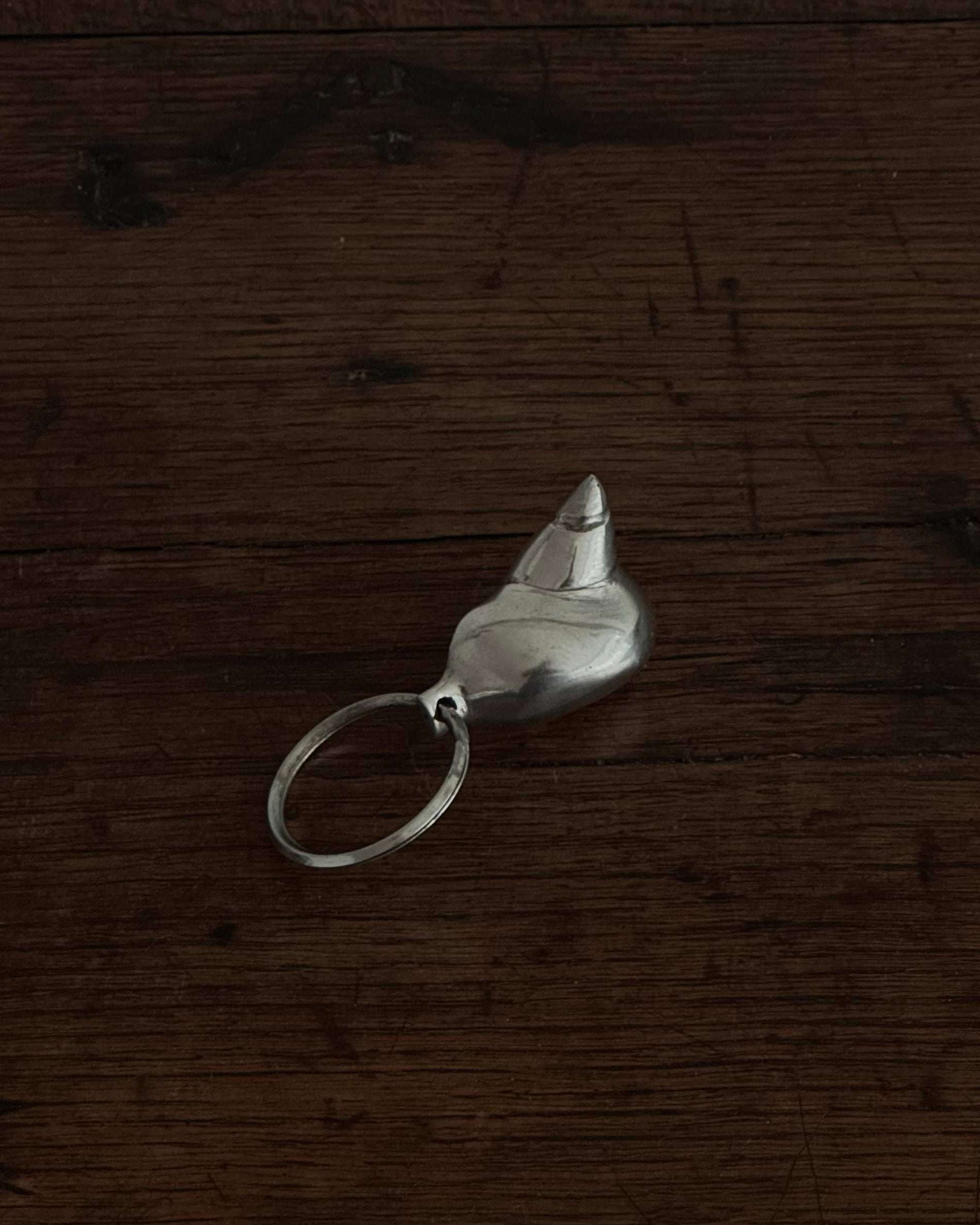 Silver coloured shell keychain