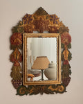 Mexican folk art punched tin mirror with colourful painted florals and fruits