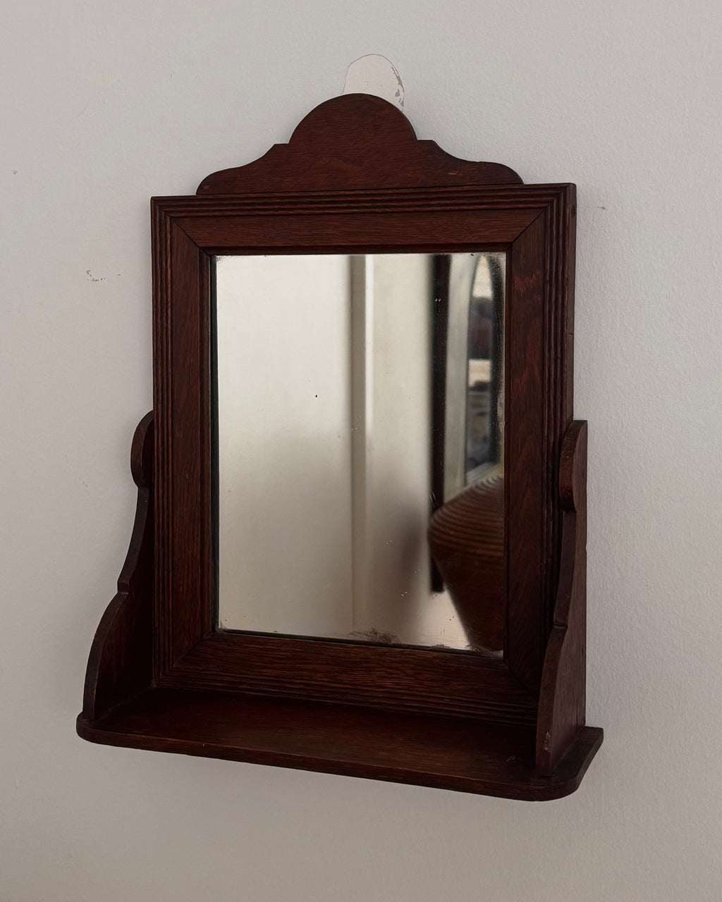 Dark wooden vanity or wall hanging mirror with ledge